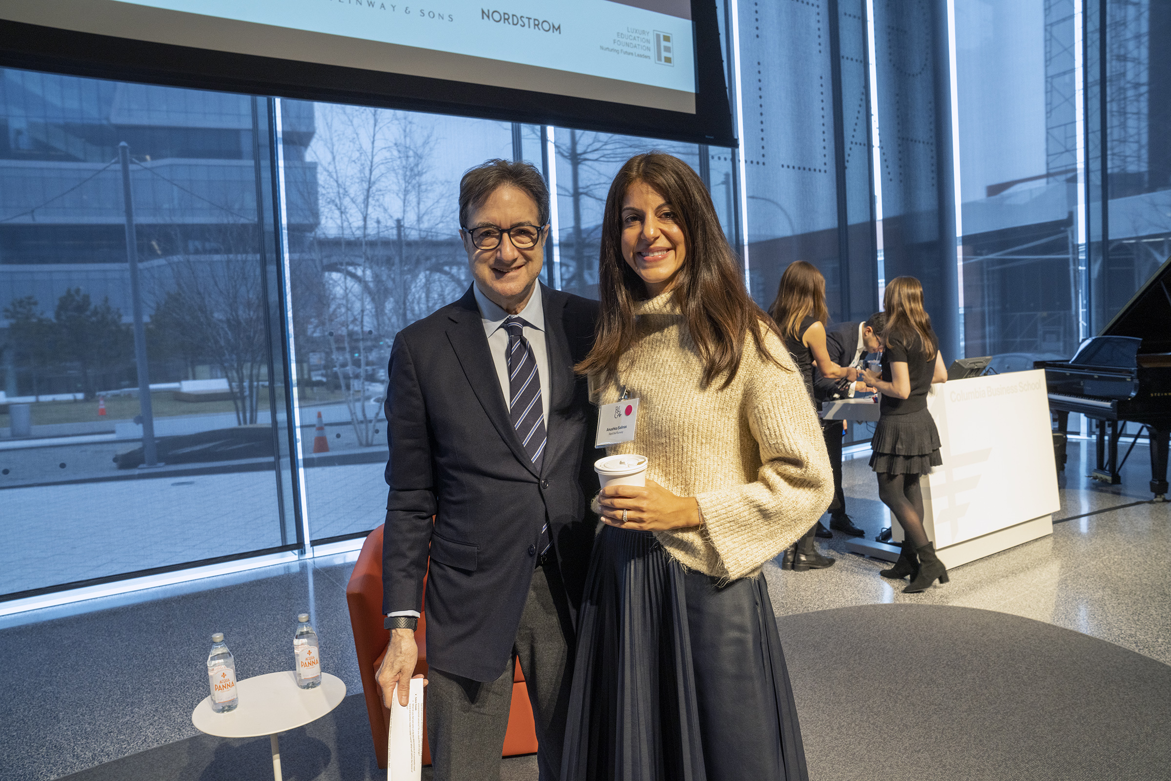 Professor Mark A. Cohen, left, with Anushka Salinas ’10, president and COO of Rent the Runway